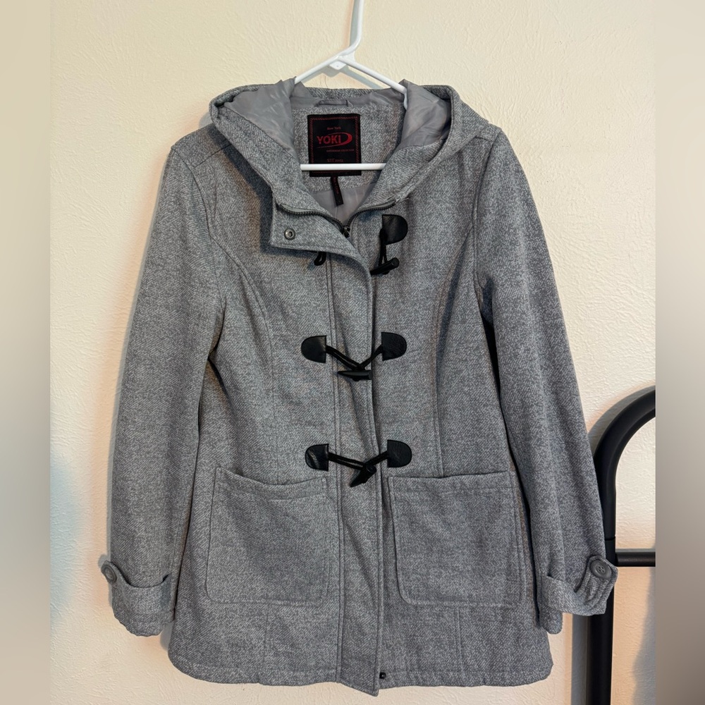Like new women’s pea-coat. Worn only once or twice. Size large